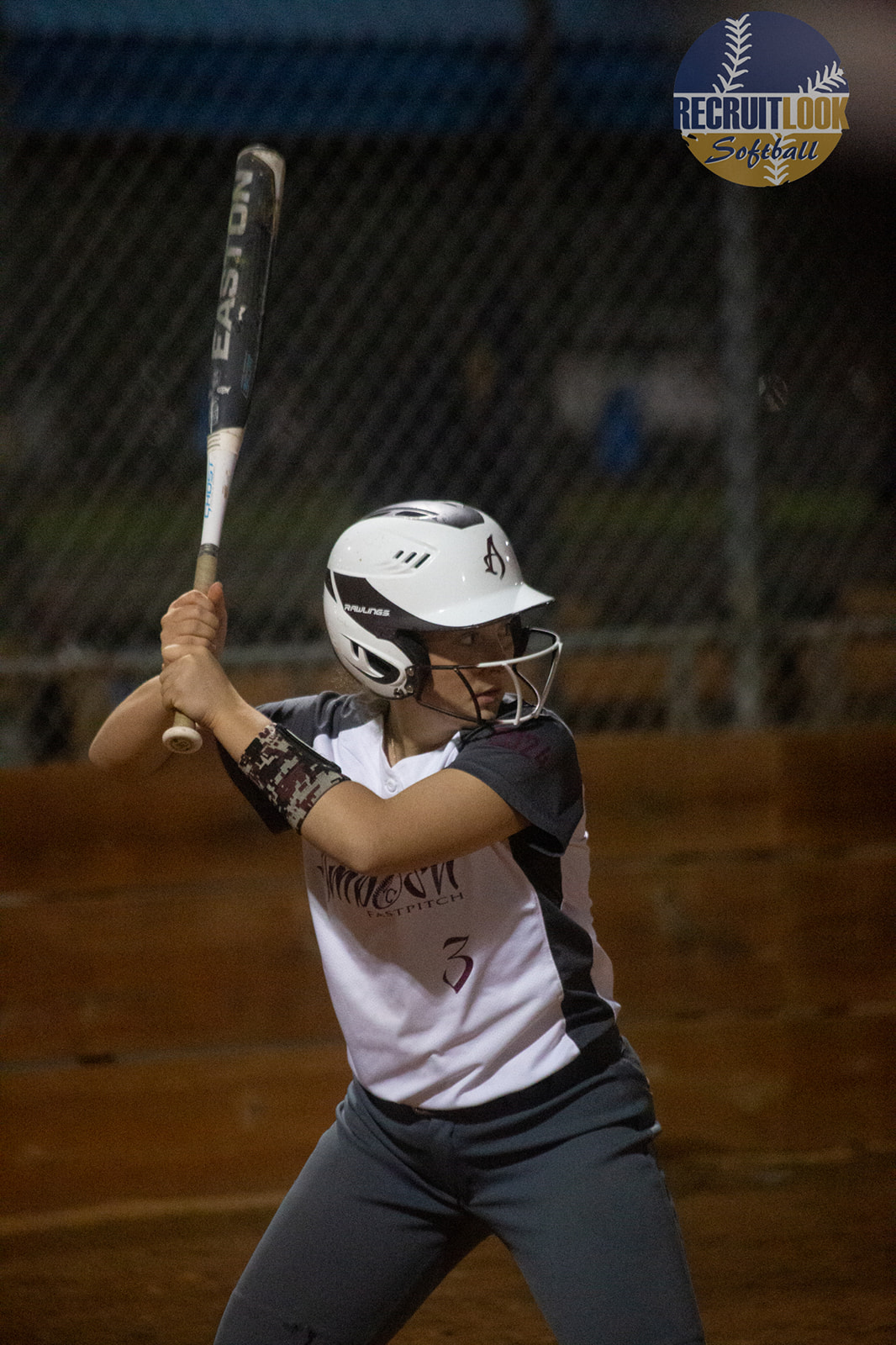 Softball player hitting