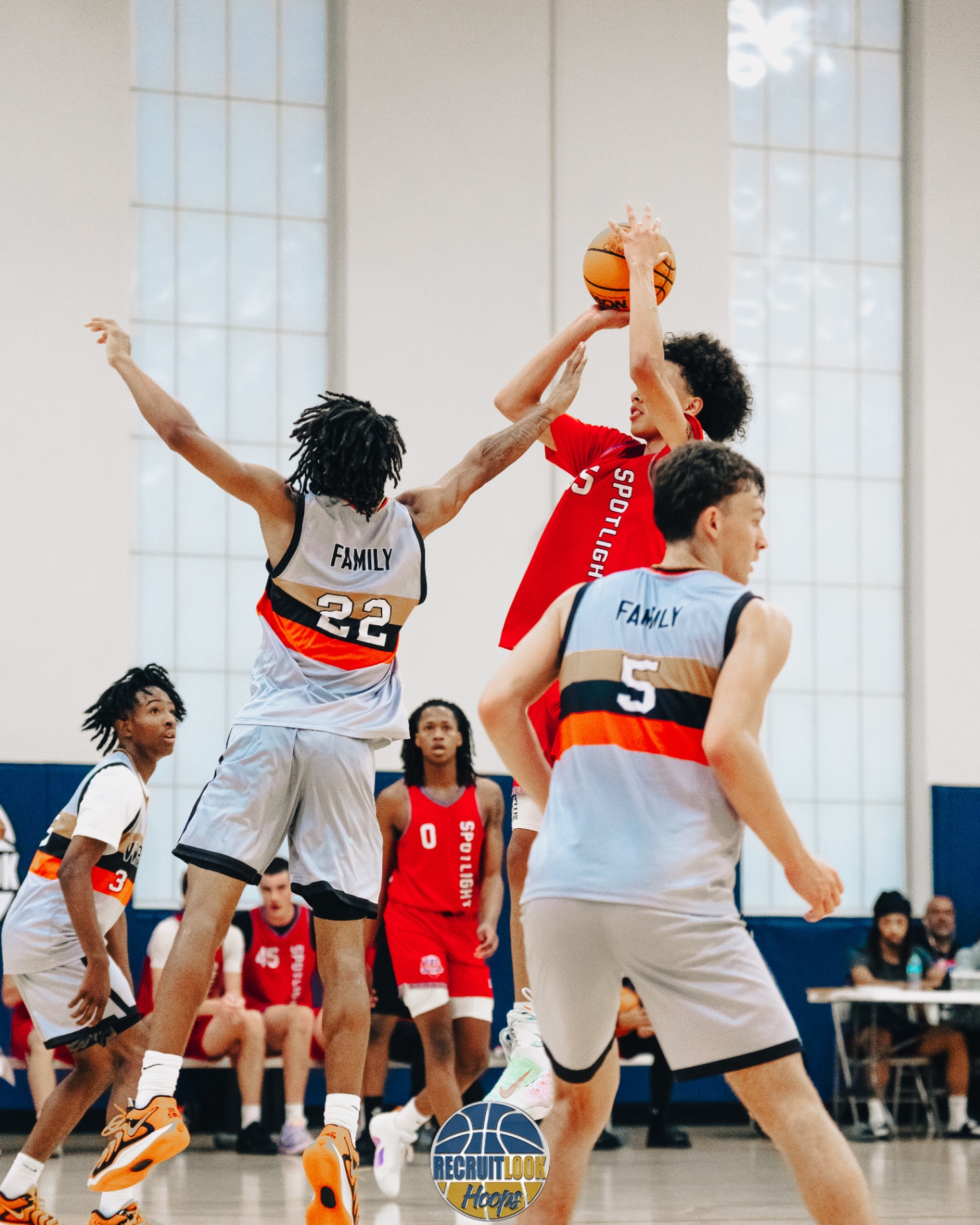 Basketball players in competitive action